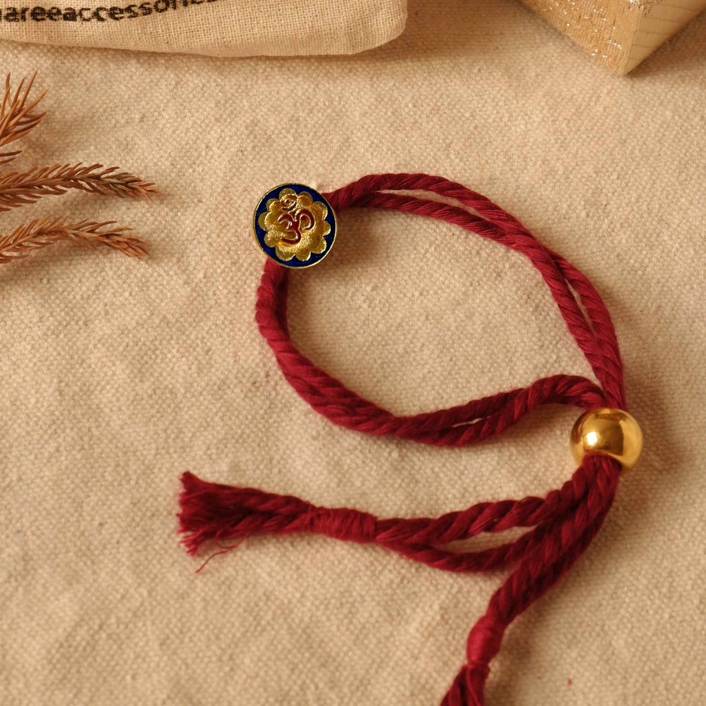 Om & Evil eye Rakhis Combo