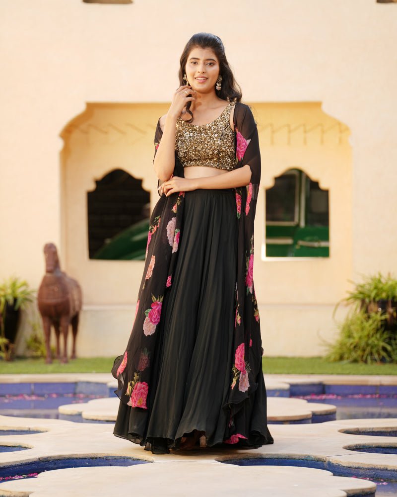 Black lehenga with sequins blouse and printed cape