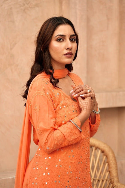 Inara Chikankari and mirror work Garara set in Orange