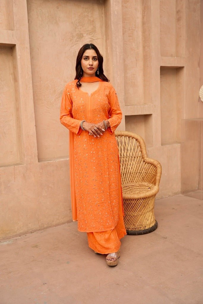 Inara chikankari and mirror work kurti in Orange