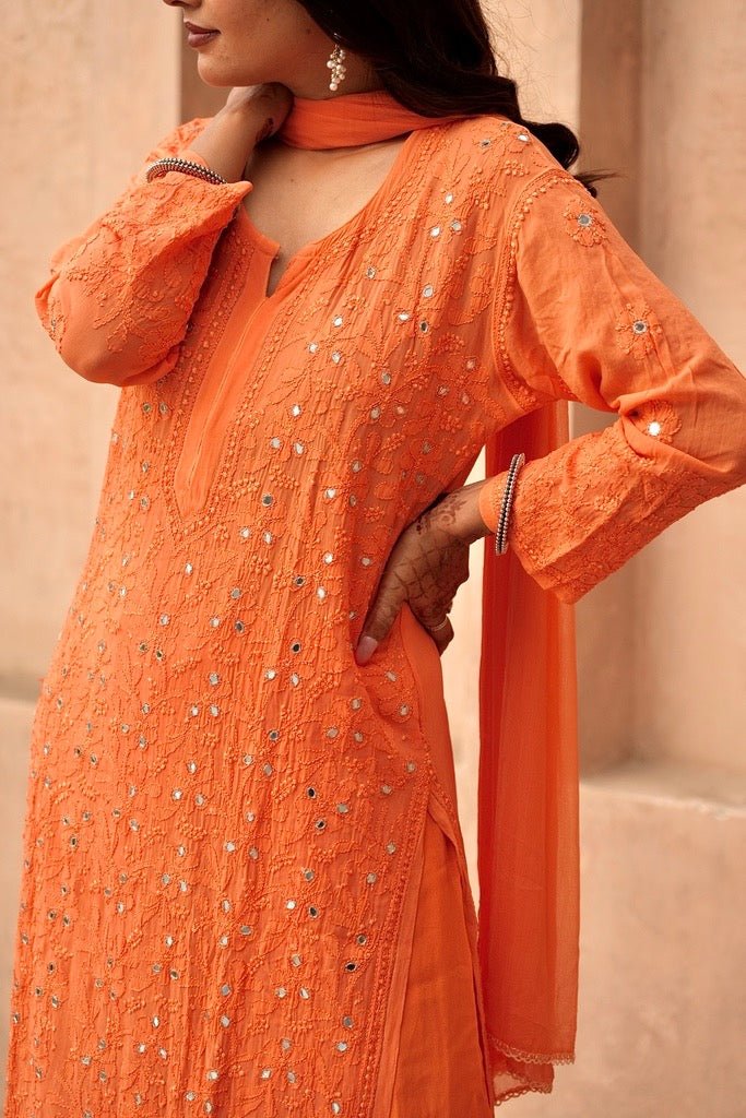 Inara Chikankari and mirror work Garara set in Orange