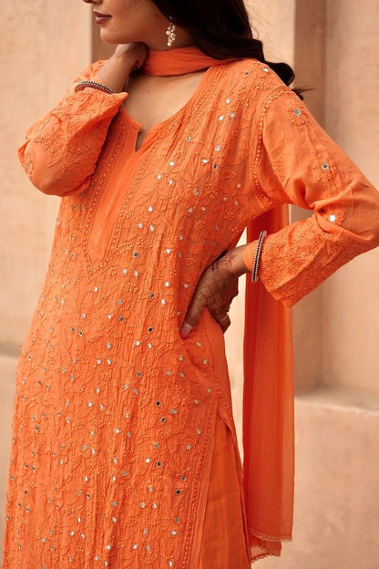 Inara chikankari and mirror work kurti in Orange