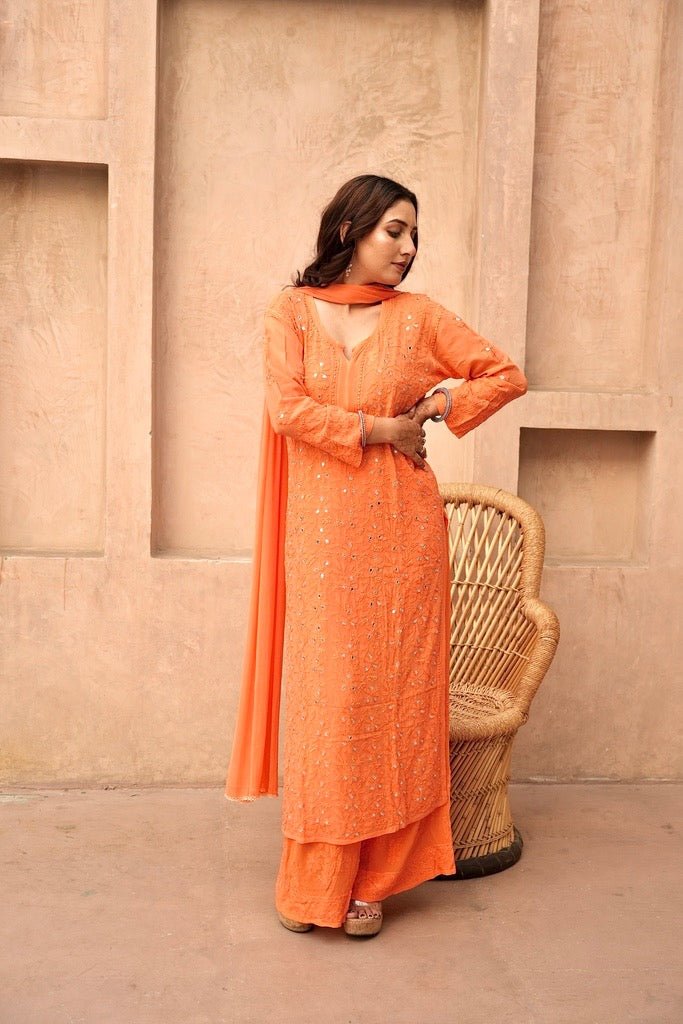 Inara Chikankari and mirror work Garara set in Orange