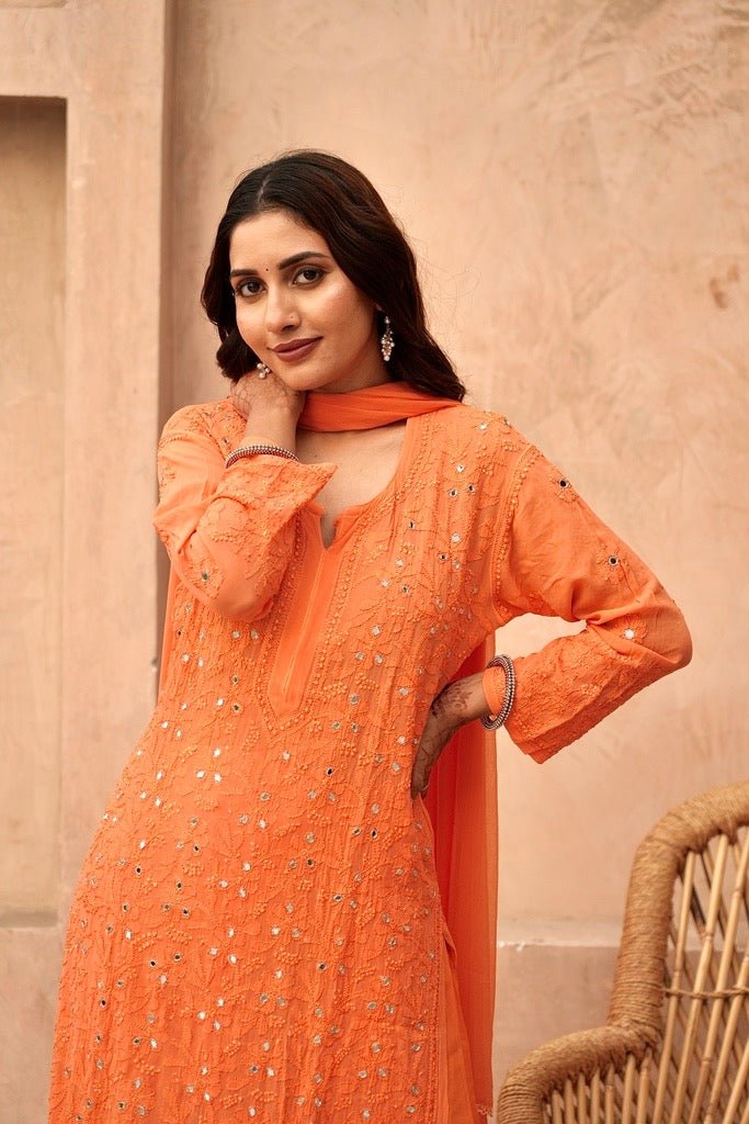 Inara Chikankari and mirror work Garara set in Orange