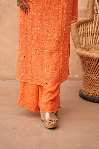 Inara Chikankari and mirror work Garara set in Orange