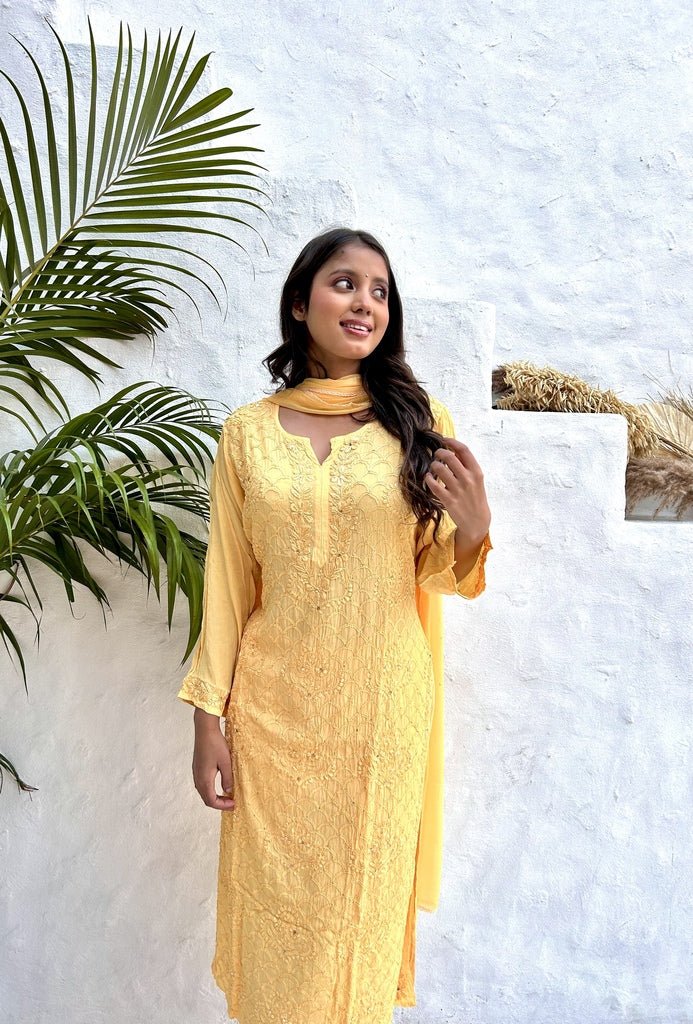 Fara chikankari and mukaish crepe set in Yellow